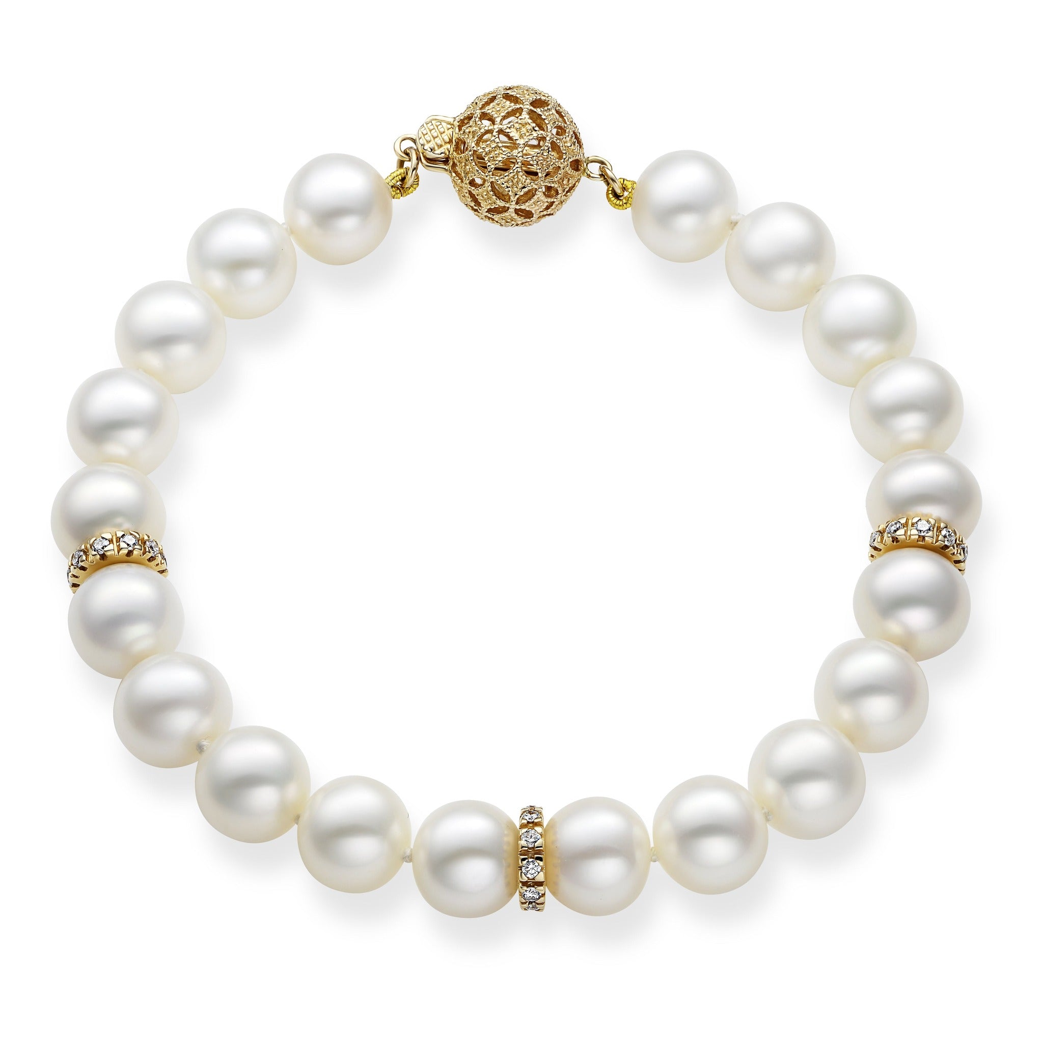 Elegant 14k gold bracelet by Isaac Westman featuring diamonds and pearls, showcasing a luxurious and sophisticated jewelry design.
