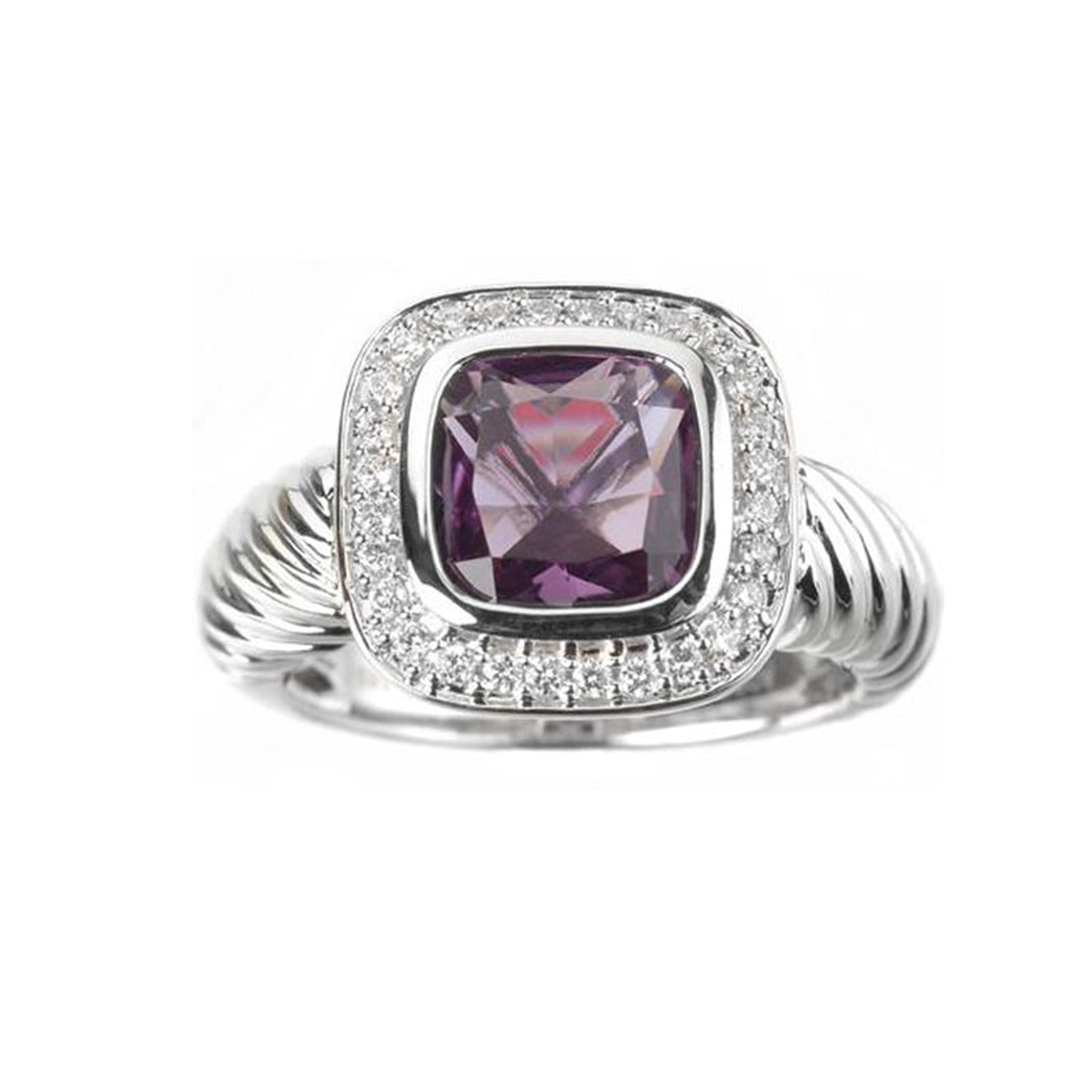 14k white gold Amethyst and diamond ring by Isaac Westman featuring a central purple gemstone and sparkling diamond accents.