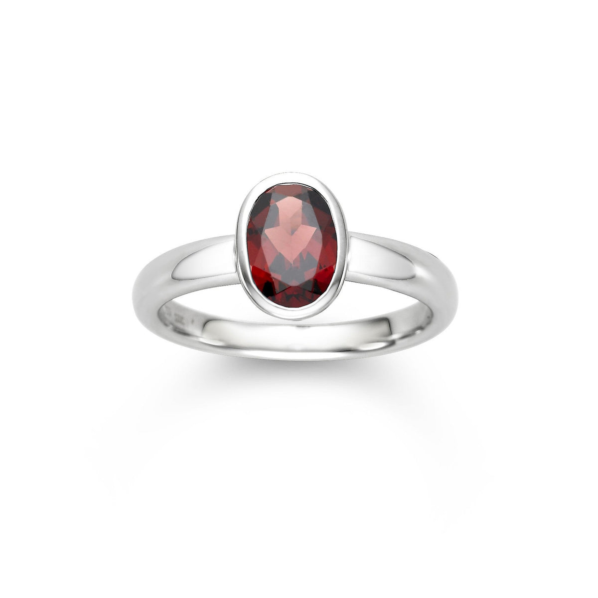 Solitaire garnet ring by ISAAC WESTMAN® featuring a bezel-set deep red garnet in 14k white gold.