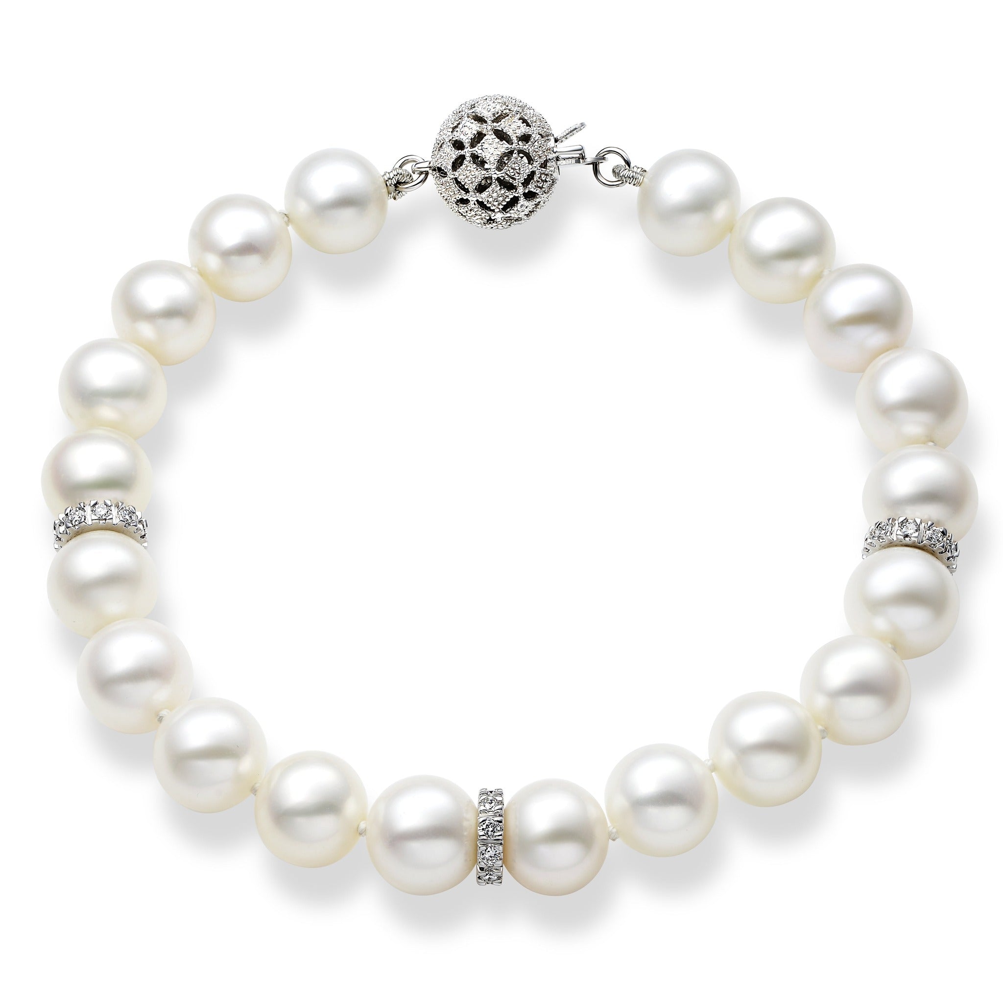 Elegant Isaac Westman® 14k white gold diamond and pearl bracelet showcasing sparkling diamonds and lustrous pearls.