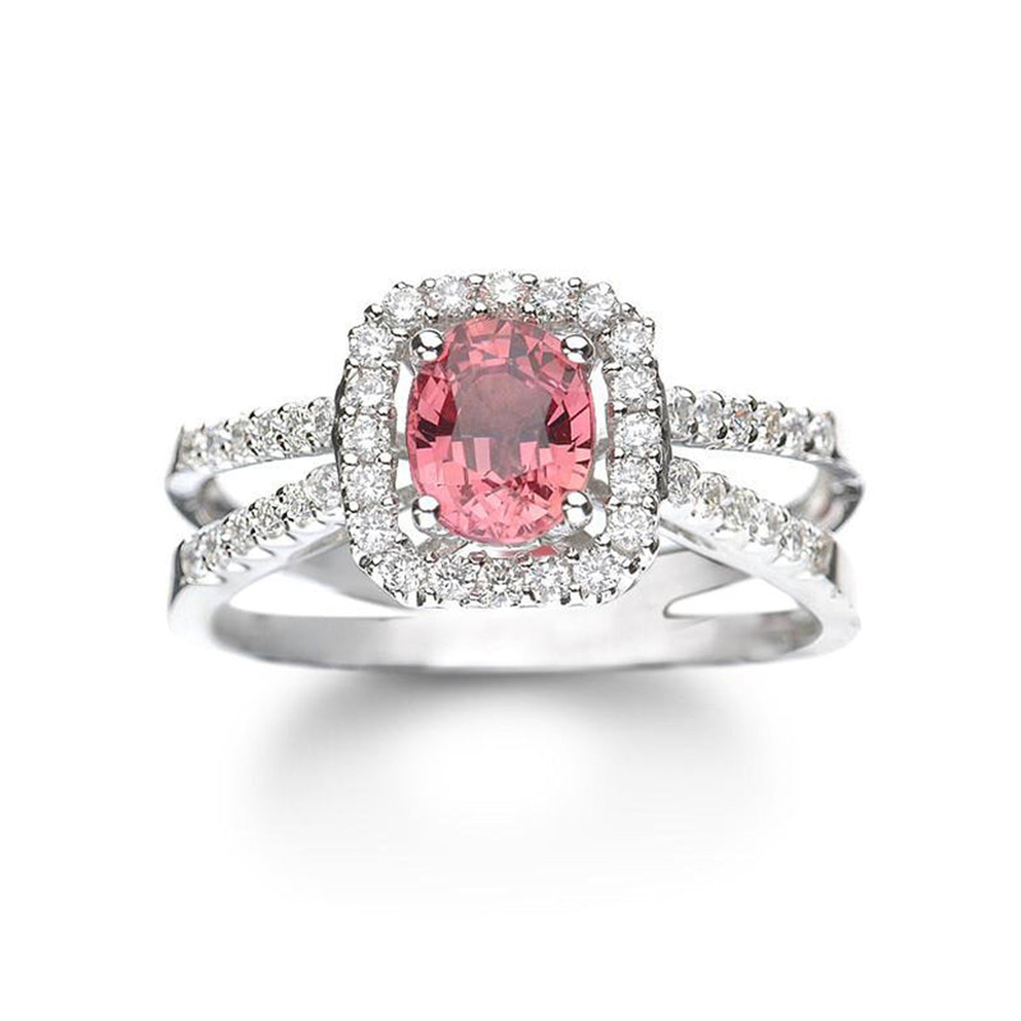 14k white gold pink sapphire and diamond ring by ISAAC WESTMAN®, featuring a vibrant pink sapphire centerpiece and sparkling diamonds.