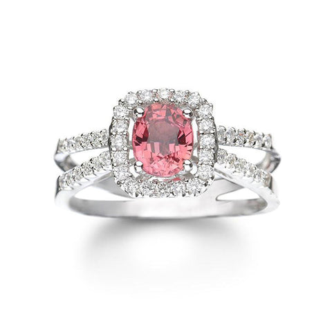 14k white gold pink sapphire and diamond ring by ISAAC WESTMAN®, featuring a vibrant pink sapphire centerpiece and sparkling diamonds.
