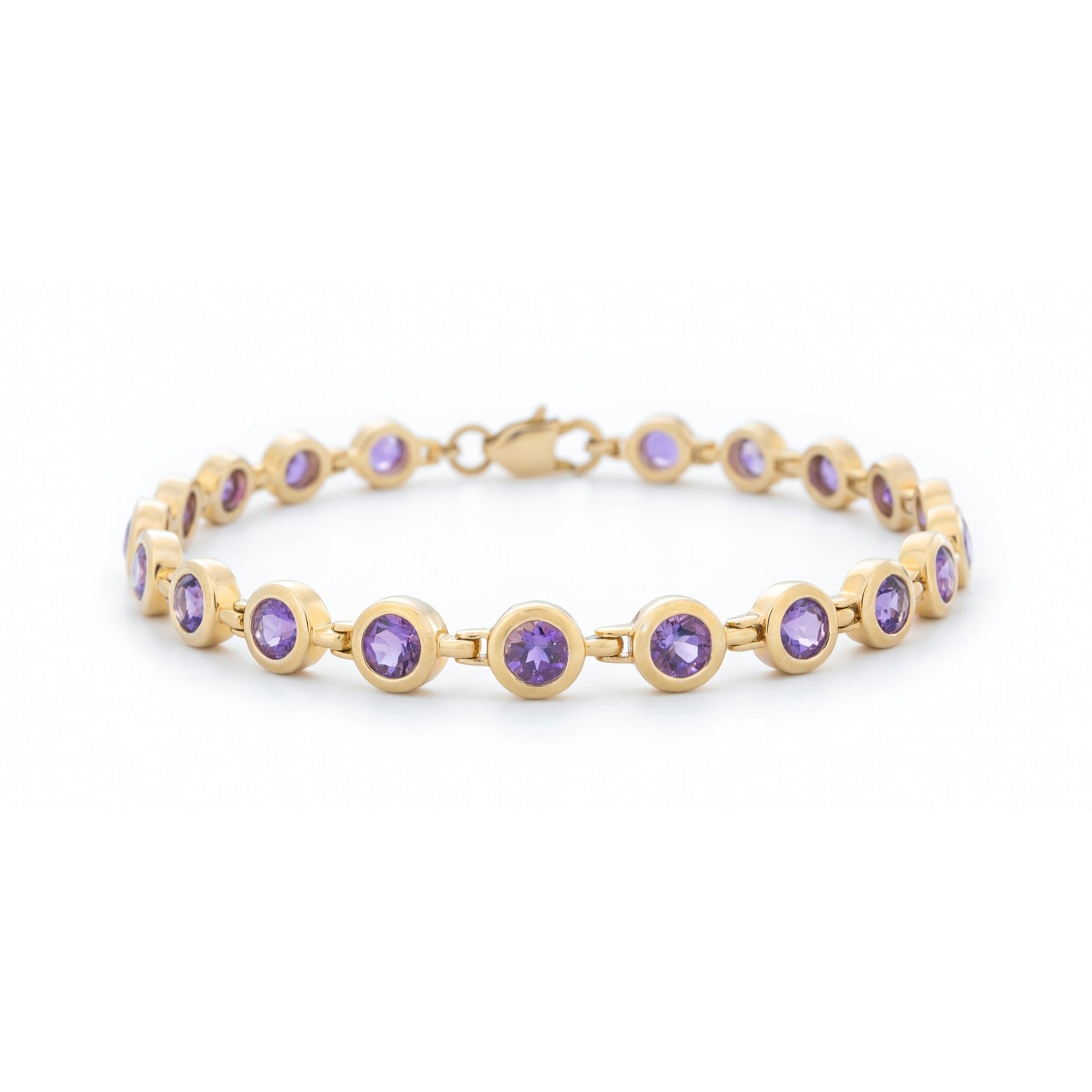 ISAAC WESTMAN® Luminance 14K yellow gold amethyst bracelet with polished gold links and a central amethyst gemstone.
