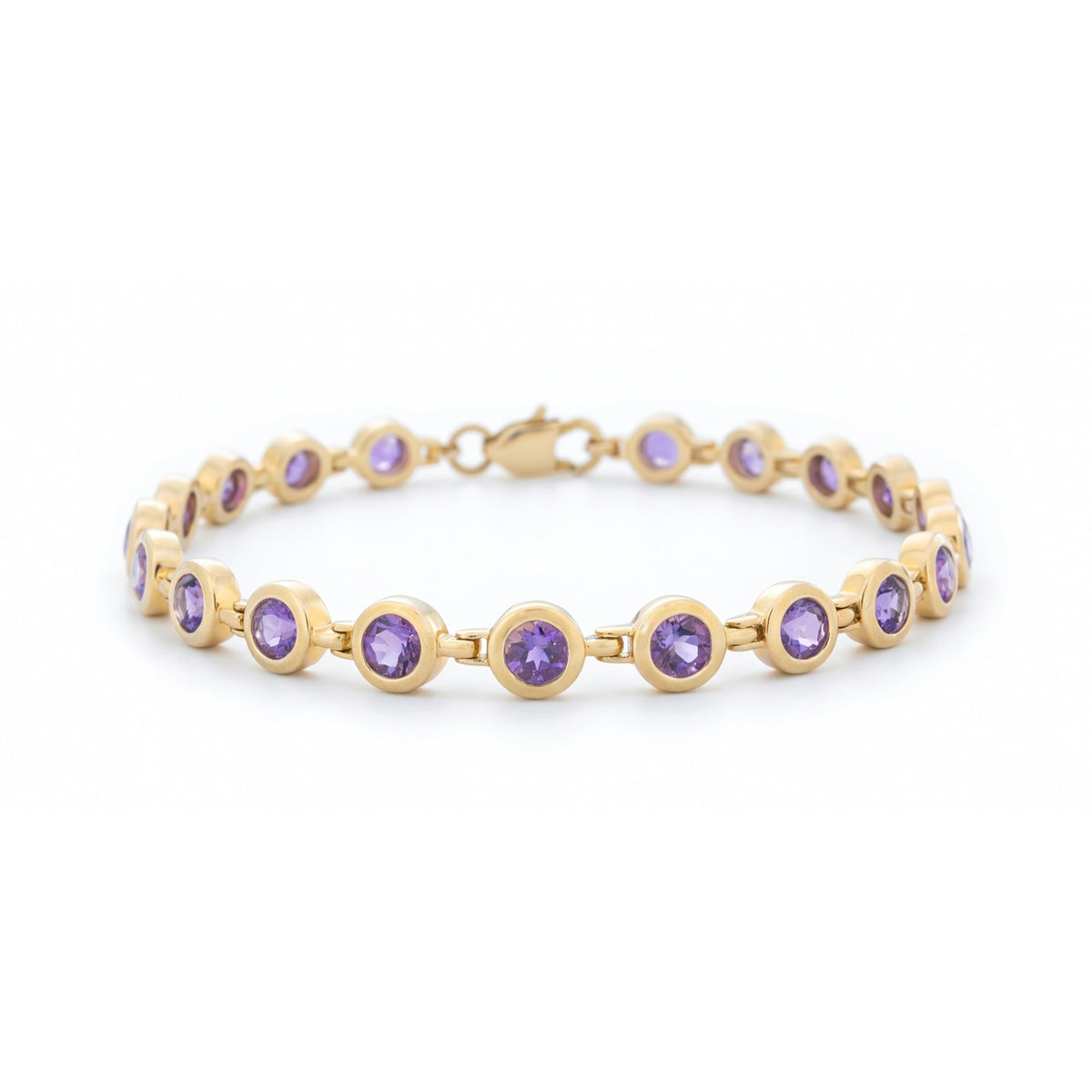 ISAAC WESTMAN® Luminance 14K yellow gold amethyst bracelet with polished gold links and a central amethyst gemstone.