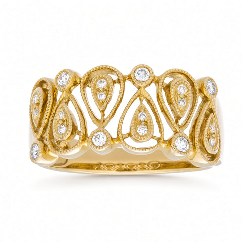 A yellow gold ring featuring an intricate filigree design with teardrop motifs and multiple round-cut diamonds, set against a plain white background.