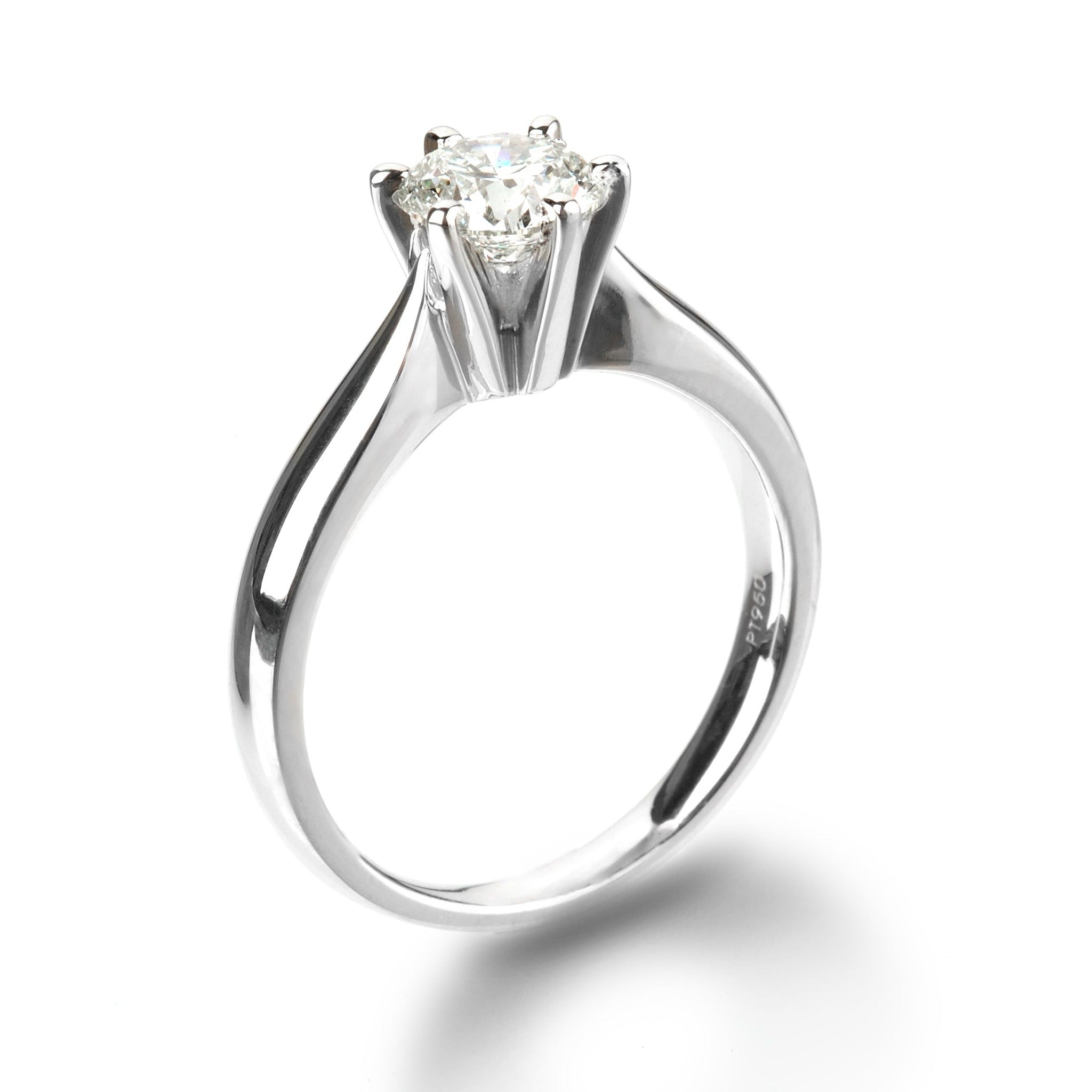 Isaac Westman® 1 carat solitaire diamond engagement ring with six-prong platinum setting, showcasing a sparkling central diamond.