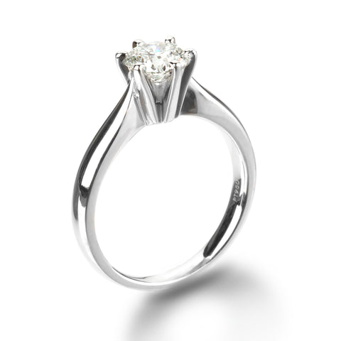 Isaac Westman® 1 carat solitaire diamond engagement ring with six-prong platinum setting, showcasing a sparkling central diamond.