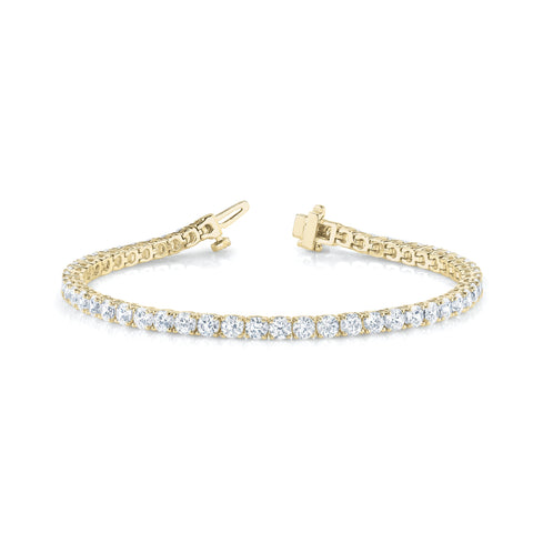 ISAAC WESTMAN® 3 Ctw diamond tennis bracelet with yellow gold setting, featuring sparkling round-cut diamonds on a delicate chain.