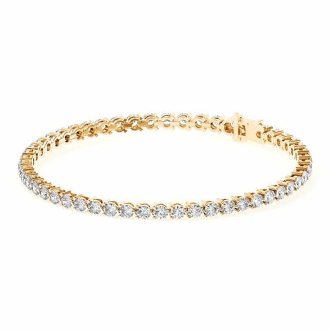 Diamond tennis bracelet with 5 carats total weight featuring three prong setting, crafted by ISAAC WESTMAN®.