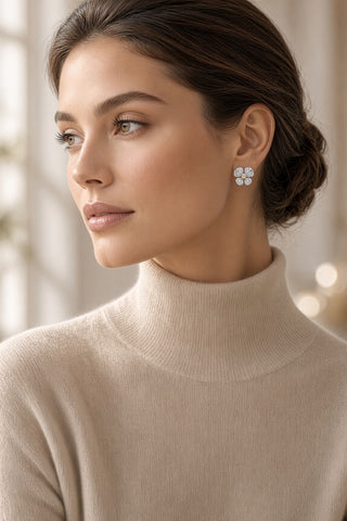 Model wearing ISAAC WESTMAN yellow and white diamond flower stud earrings