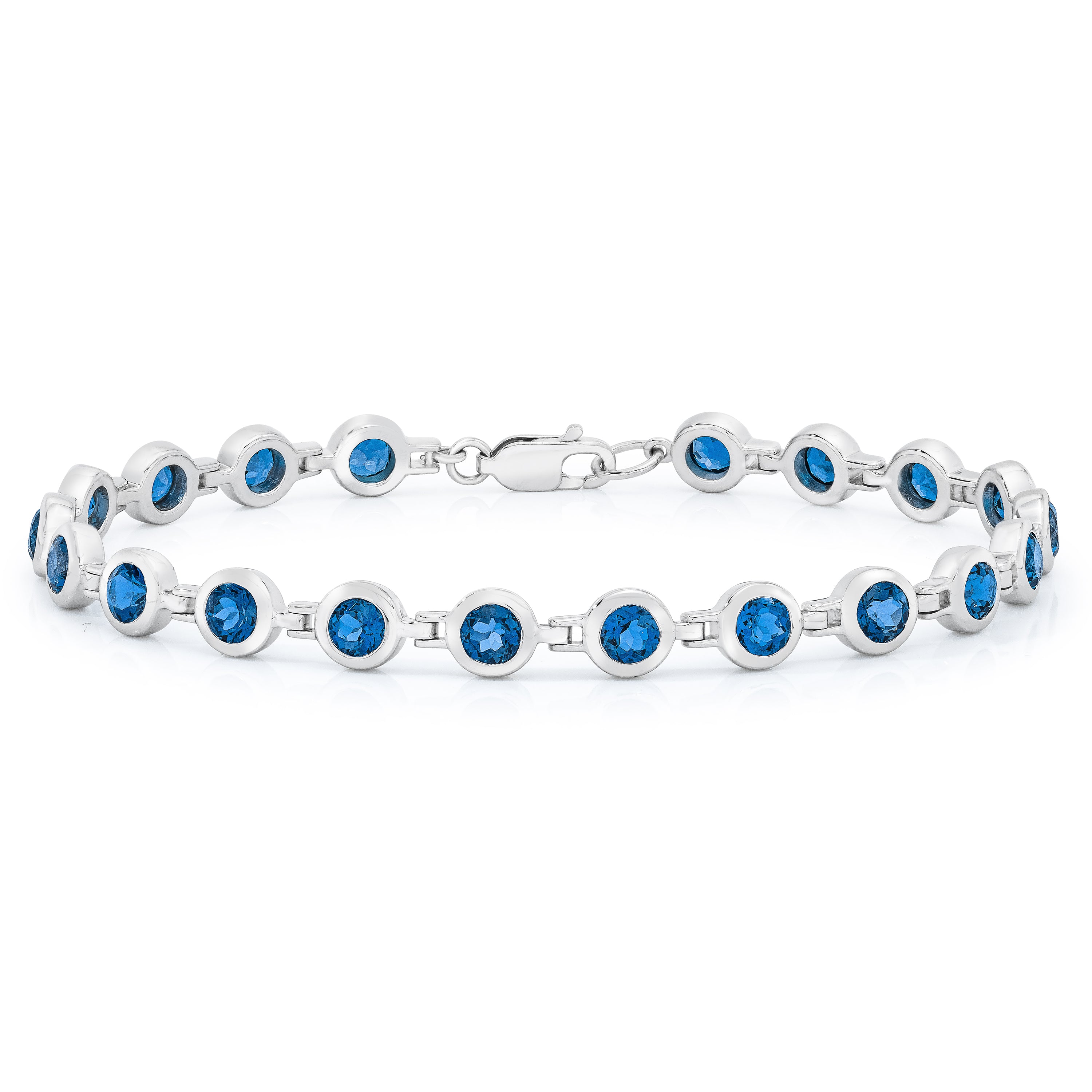 A bracelet featuring round blue gemstones set in a white gold metal bracelet with a buckle clasp.