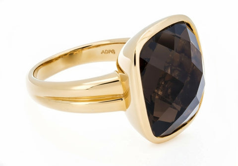 Gold ring with a large smoky quartz stone on a white background ISAAC WESTMAN®