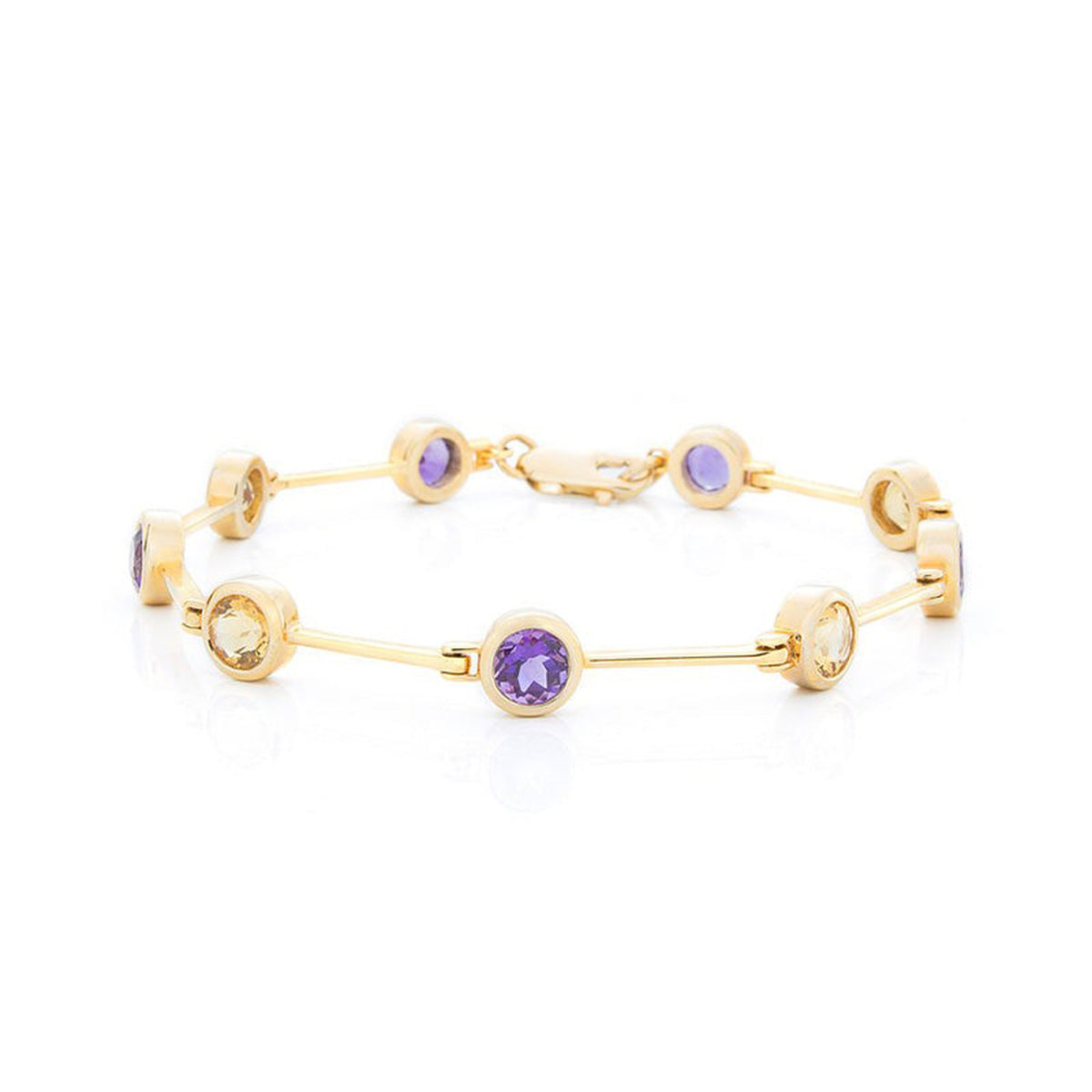 Amethyst and citrine gold bracelet by ISAAC WESTMAN® featuring purple amethyst and yellow citrine gemstones on a 14K gold band.