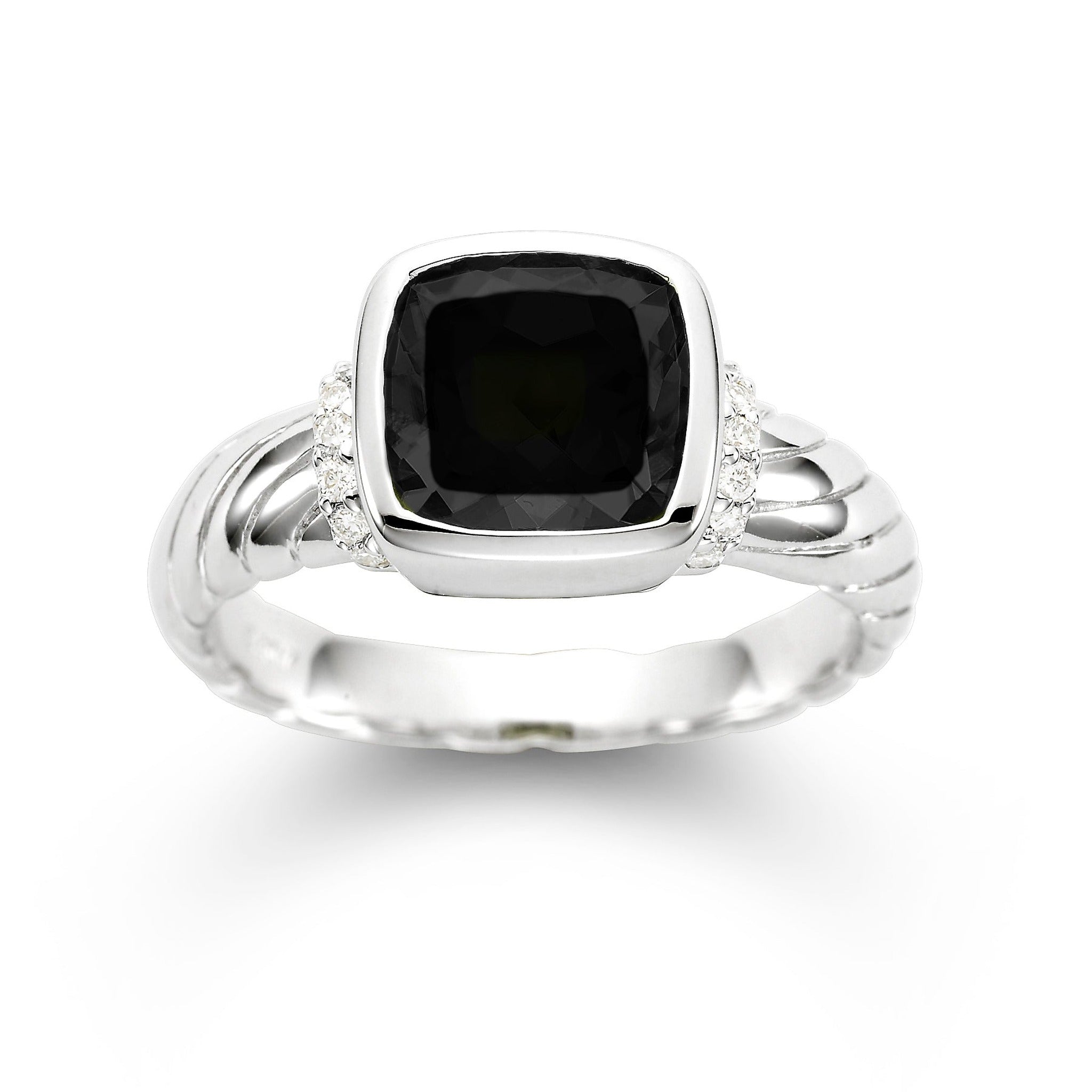 Black Onyx and diamond ring by Isaac Westman featuring a sleek black gemstone and sparkling diamonds on a silver band.