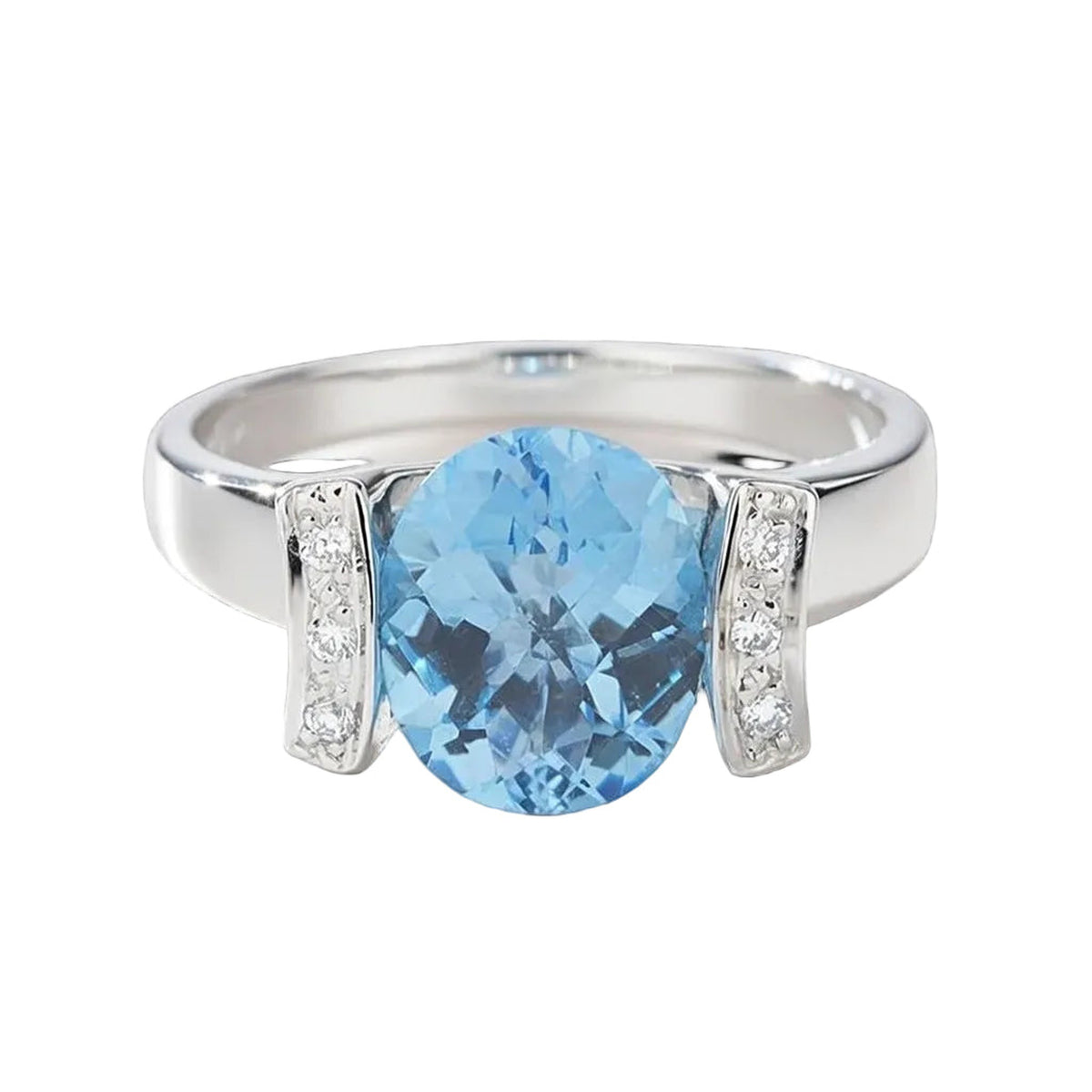 Isaac Westman Swiss Blue Topaz and diamond ring featuring an 8x10mm blue topaz center stone with diamond accents in 14K white gold
