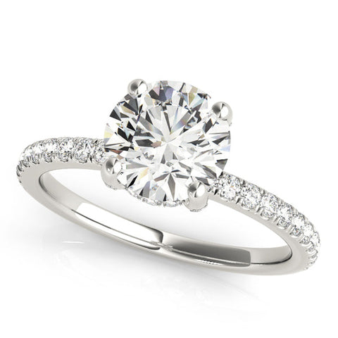 Isaac Westman® diamond engagement ring with hidden halo and sparkling center stone, elegant and detailed bridal jewelry.