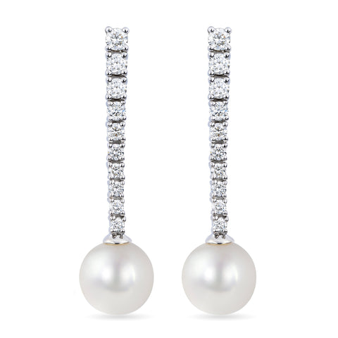 ISAAC WESTMAN diamond and freshwater pearl dangle earrings featuring elegant dangling pearls and sparkling diamonds.