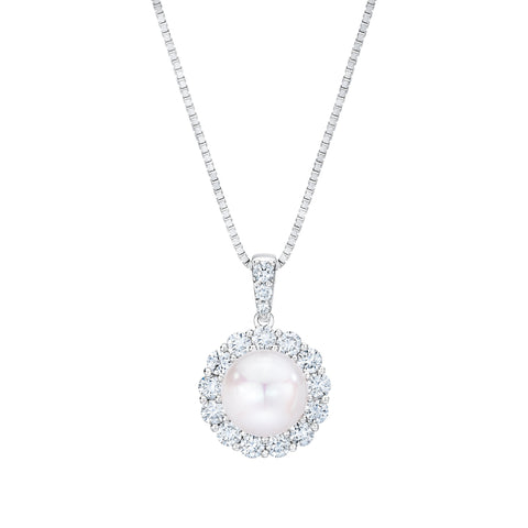 Freshwater pearl and diamond halo pendant by Isaac Westman featuring a luminous pearl surrounded by sparkling diamonds.