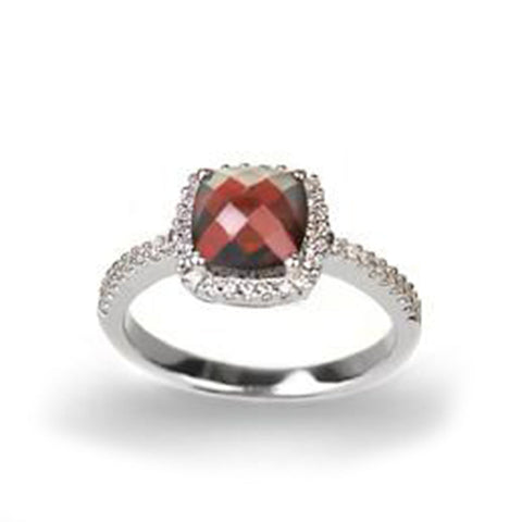 Isaac Westman garnet and diamond ring featuring a central garnet gemstone and sparkling diamonds on a sleek band.