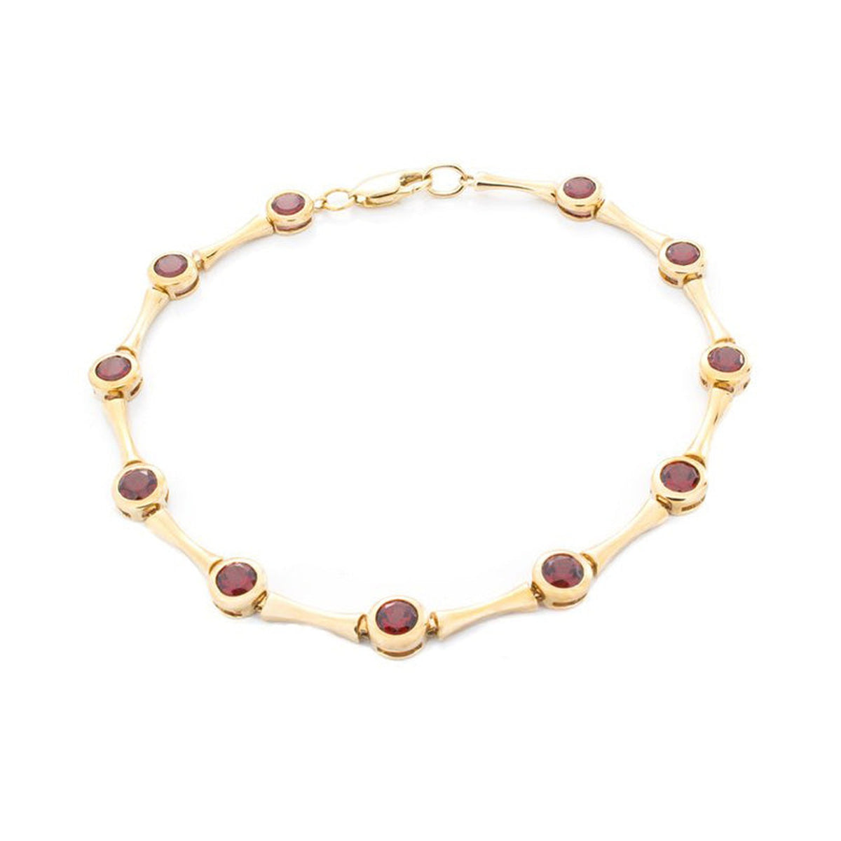 Isaac Westman garnet gold bracelet with red garnet stones and yellow 14K gold links, close-up view of elegant jewelry design.