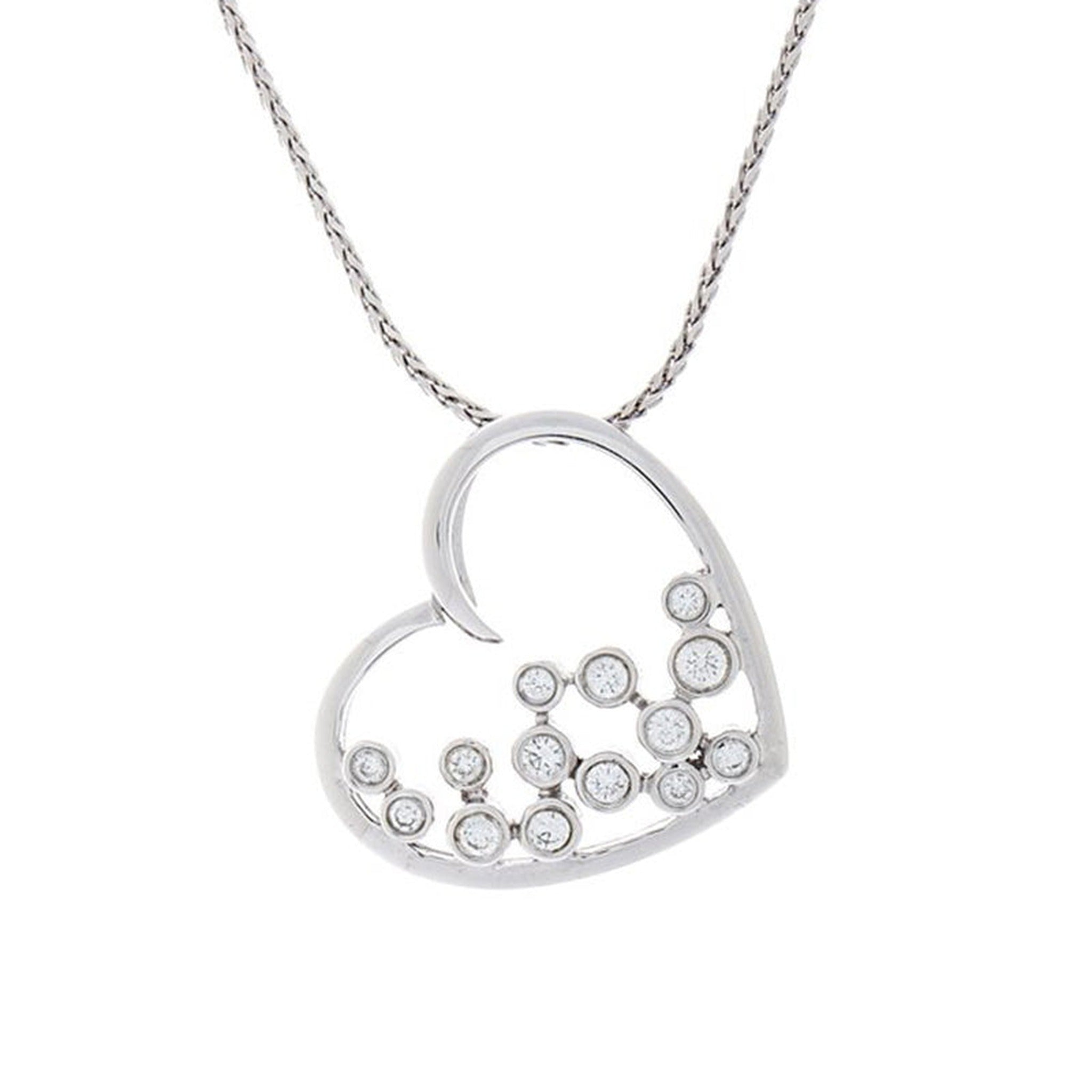 White gold and diamond heart pendant by Isaac Westman, featuring sparkling diamonds in a delicate heart-shaped design.