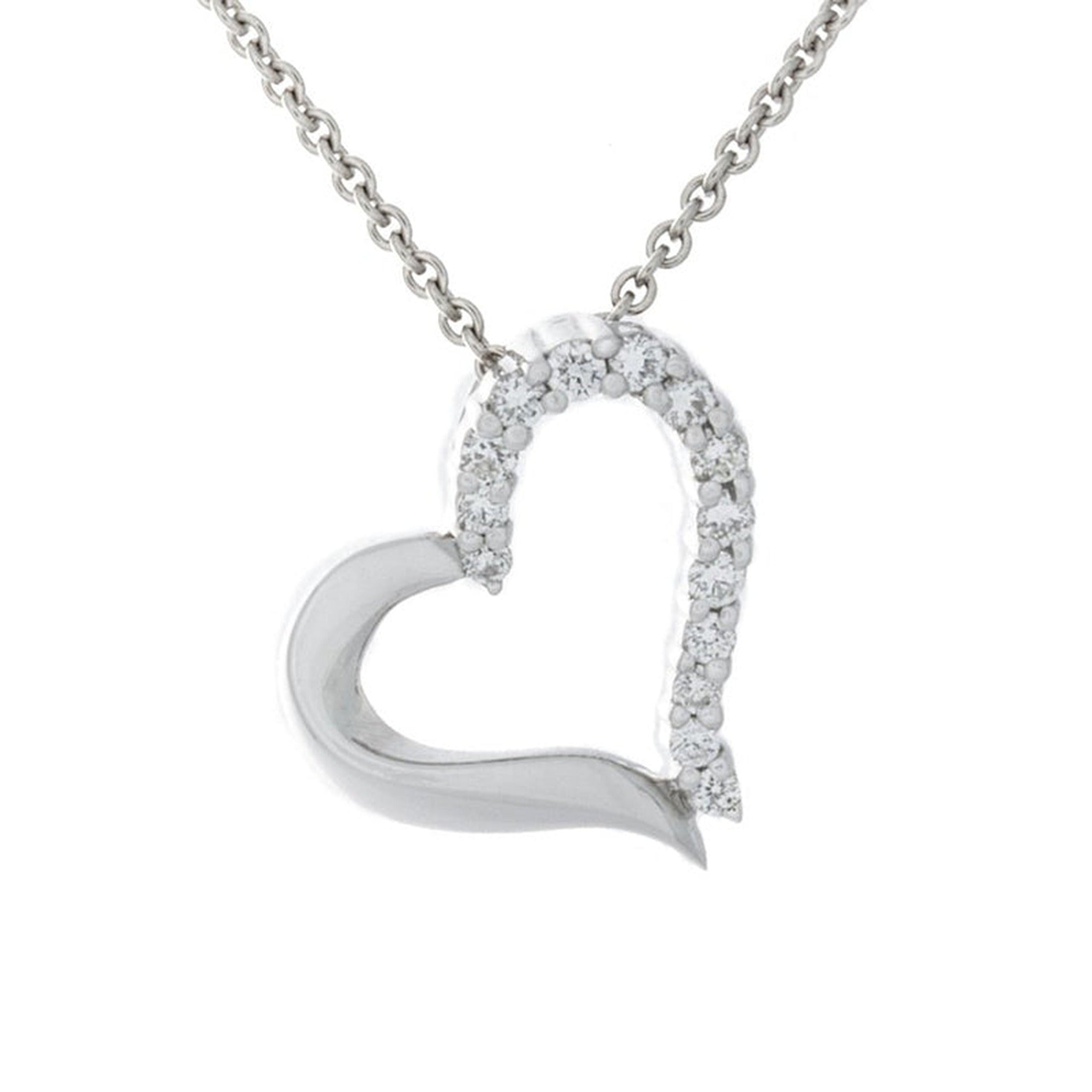 White gold heart pendant with sparkling diamonds by Isaac Westman, showcasing intricate craftsmanship and elegant jewelry design.