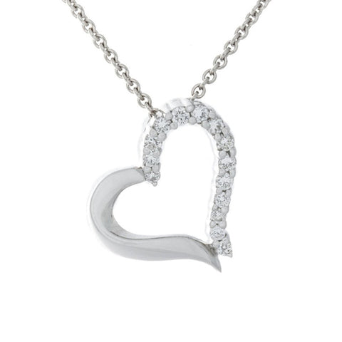 White gold heart pendant with sparkling diamonds by Isaac Westman, showcasing intricate craftsmanship and elegant jewelry design.