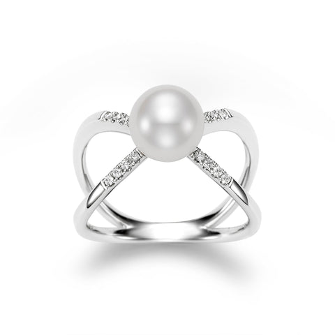 Pearl and diamond crisscross ring by ISAAC WESTMAN® featuring elegant pearl and diamond accents on a silver band.