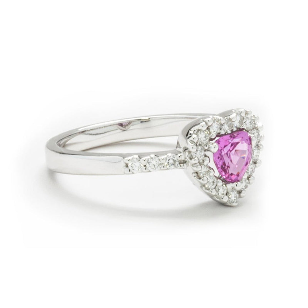 Pink sapphire heart and diamond ring by ISAAC WESTMAN®, featuring a romantic pink heart-shaped gemstone and sparkling diamonds.