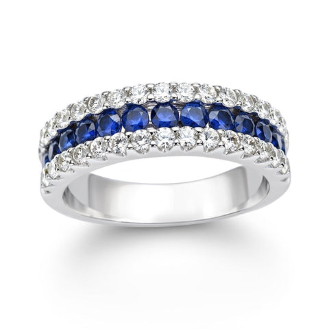 14K white gold blue sapphire and diamond band ring by ISAAC WESTMAN®, featuring a sparkling sapphire and diamond accents.