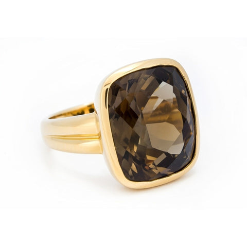 Yellow gold ring featuring a smoky quartz gemstone, crafted by Isaac Westman, showcasing elegant jewelry design.