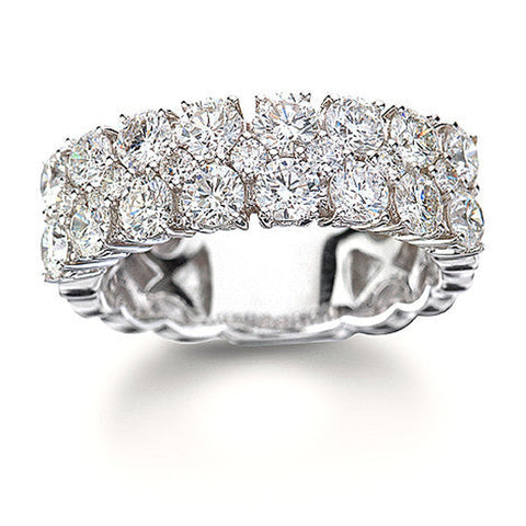 Isaac Westman triple row diamond ring featuring 2.45 carats of sparkling diamonds on a sleek band.