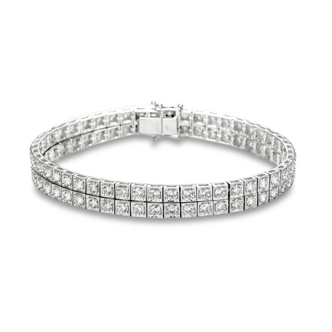 Isaac Westman two-row diamond tennis bracelet with 6.6 carats total weight, featuring sparkling diamonds on a sleek silver setting.