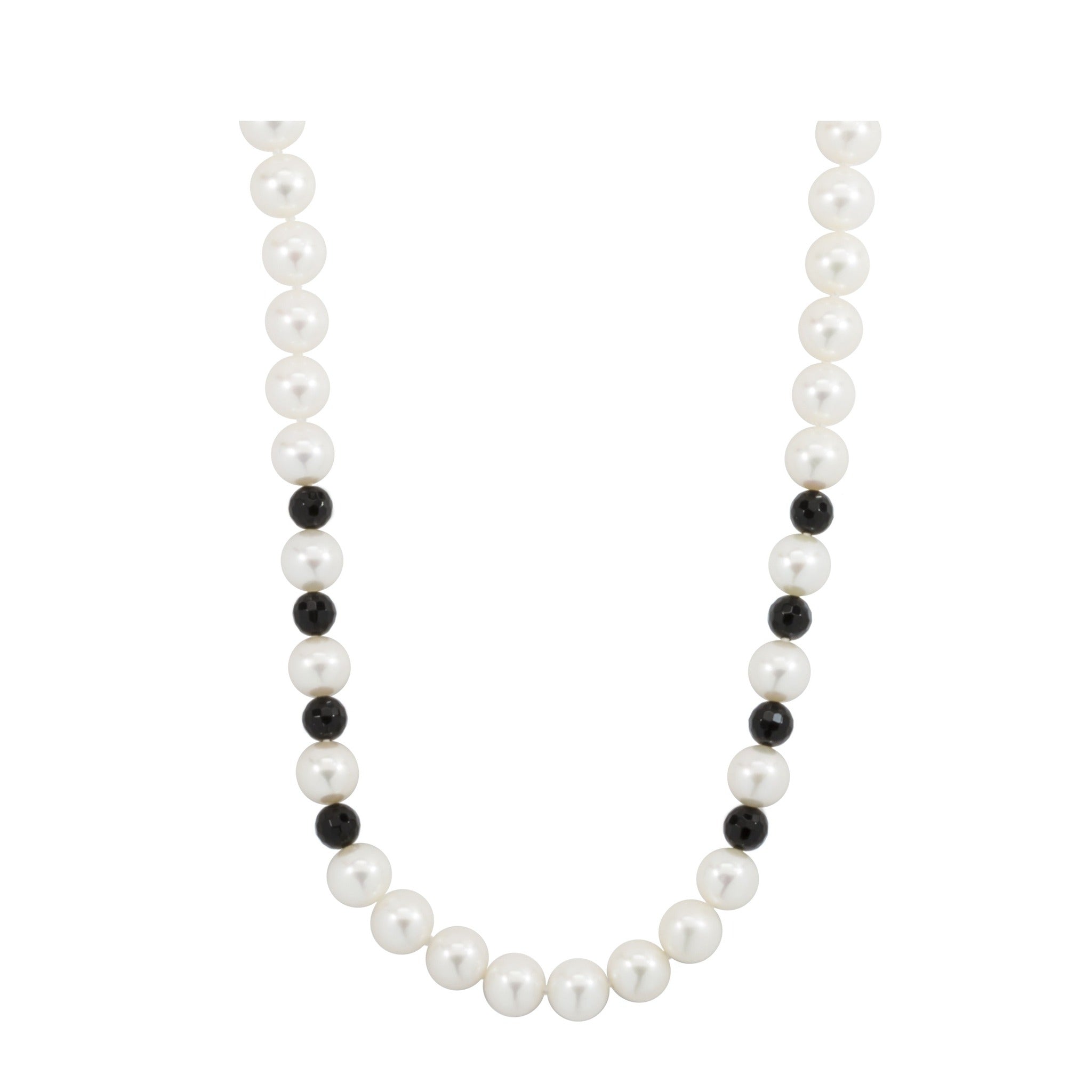 White freshwater pearl and faceted black onyx beads necklace by ISAAC WESTMAN®. Elegant jewelry with pearl and onyx beads.