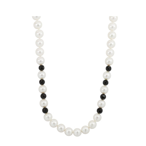 White freshwater pearl and faceted black onyx beads necklace by ISAAC WESTMAN®. Elegant jewelry with pearl and onyx beads.