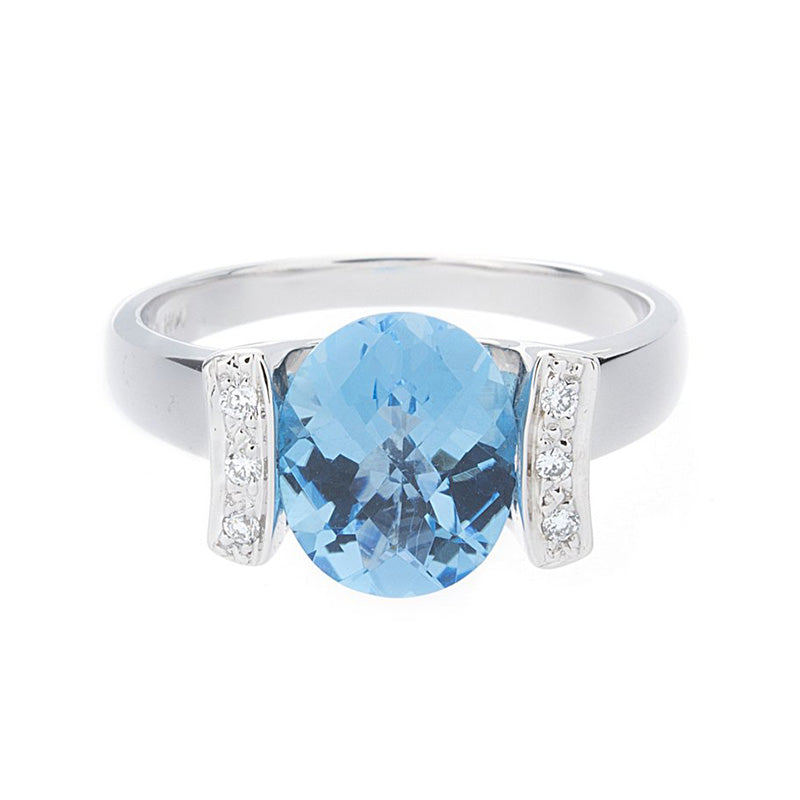 Diamond & Blue Topaz Gold Ring